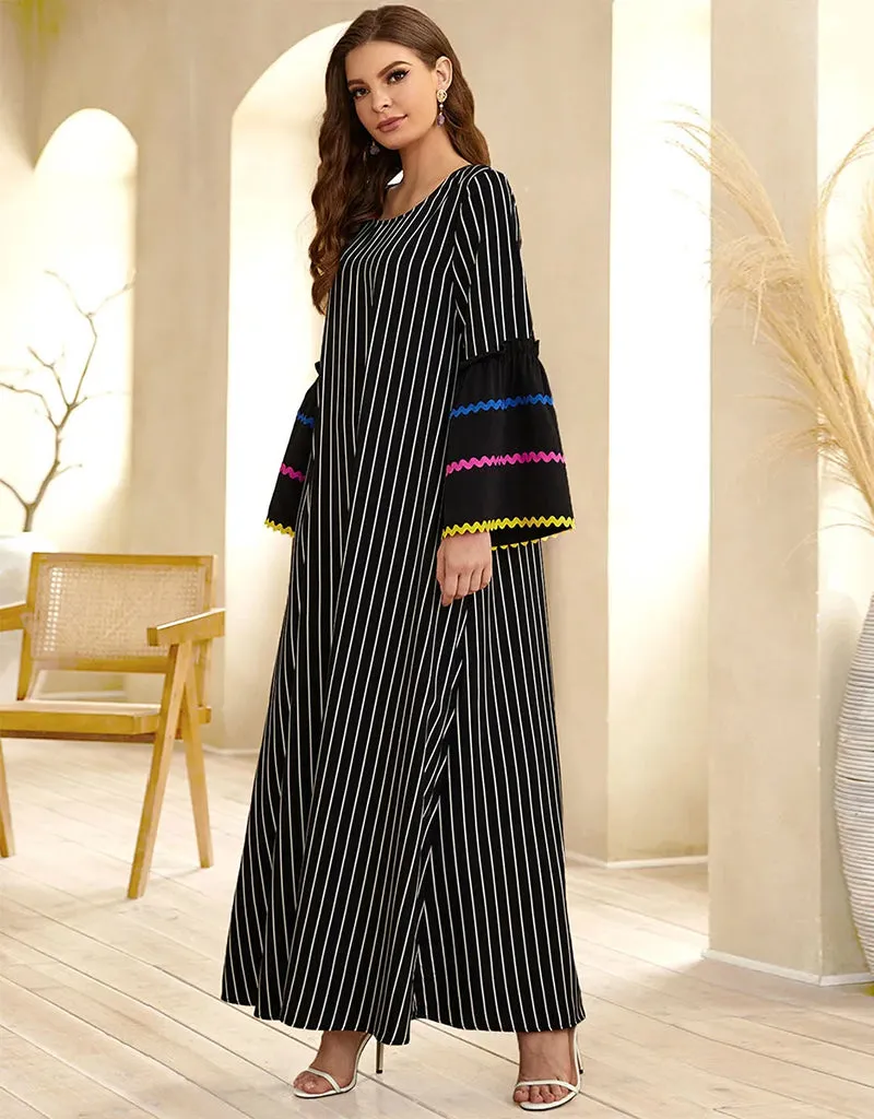 A Long Skirt Where Stripes Sing and Embroidery Dances