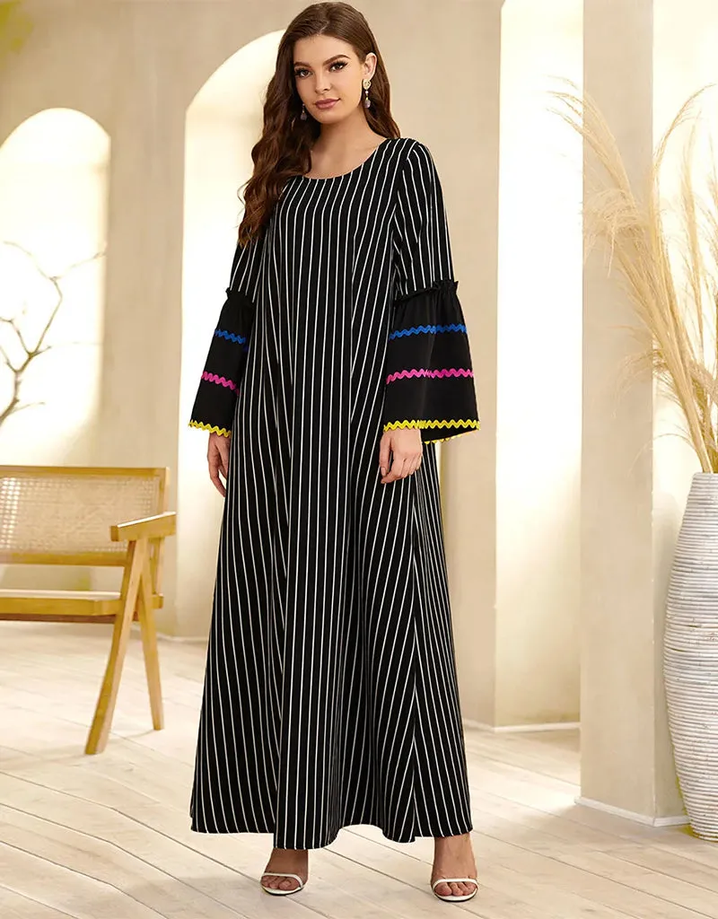 A Long Skirt Where Stripes Sing and Embroidery Dances
