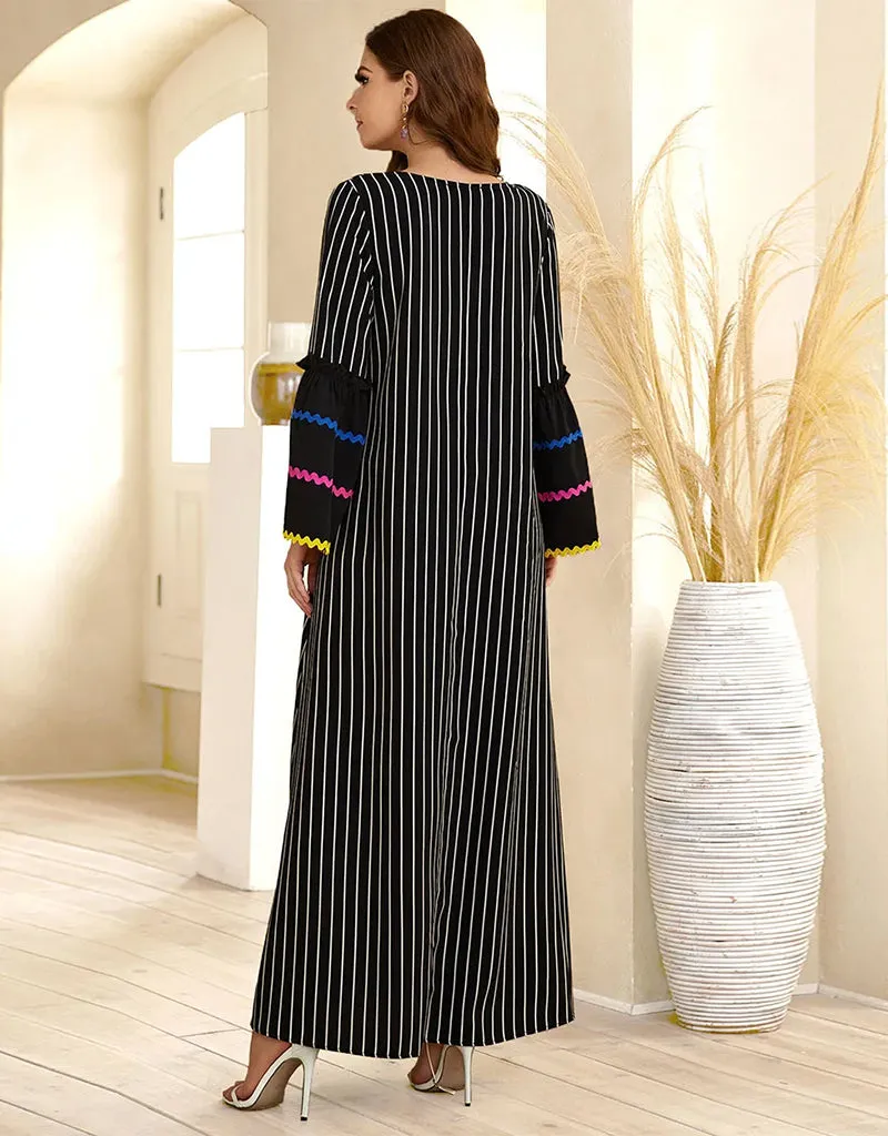 A Long Skirt Where Stripes Sing and Embroidery Dances